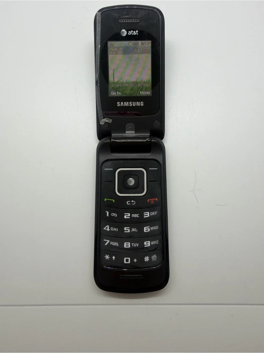 Samsung Black Flip Phone with Tactile Keypad